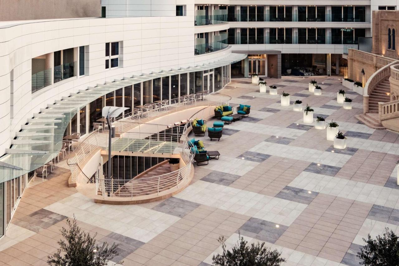 Hyatt Regency Malta Hotel Saint Julian's Exterior photo The courtyard of the new building