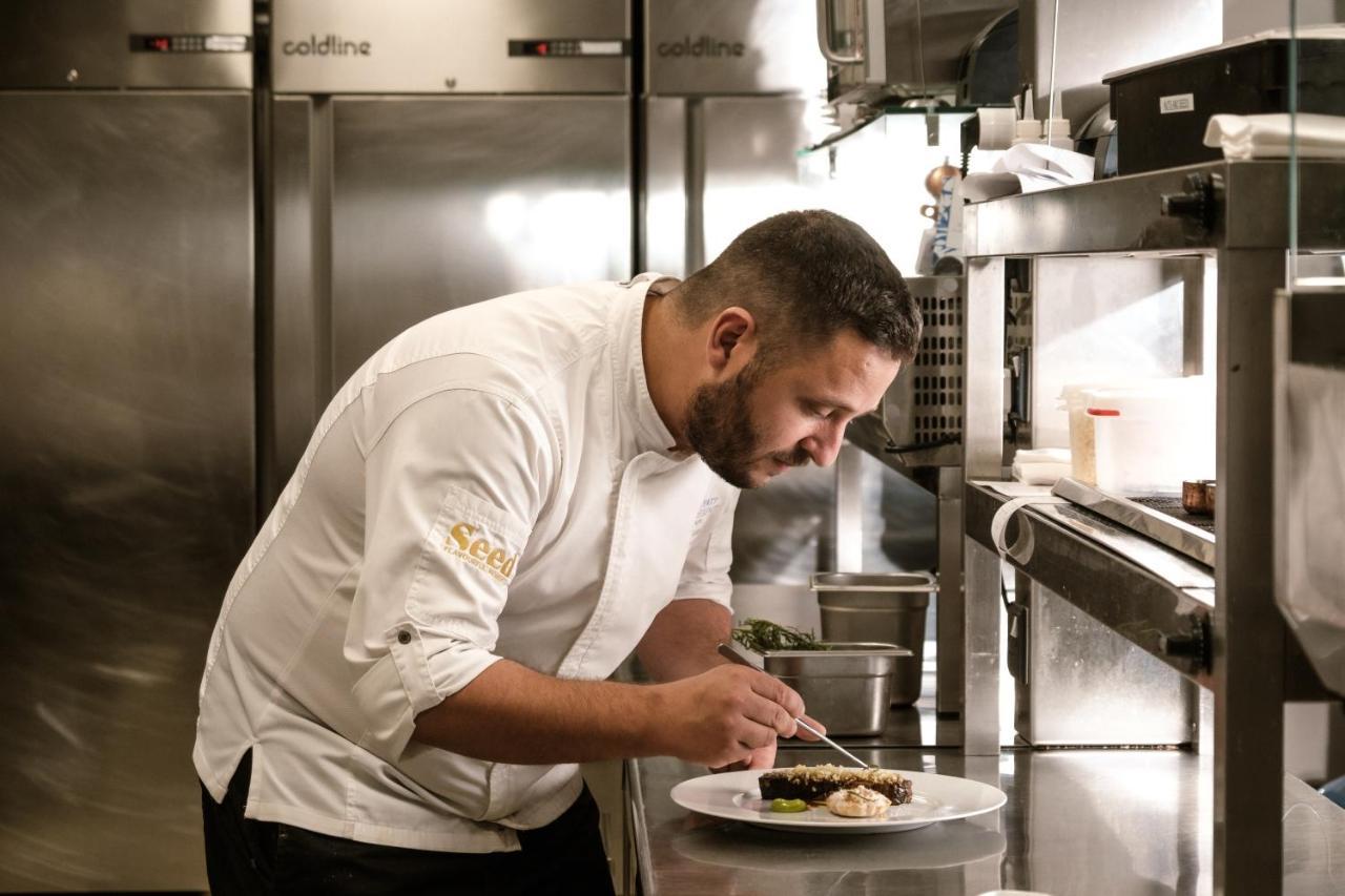 Hyatt Regency Malta Hotel Saint Julian's Exterior photo Chef preparing a meal